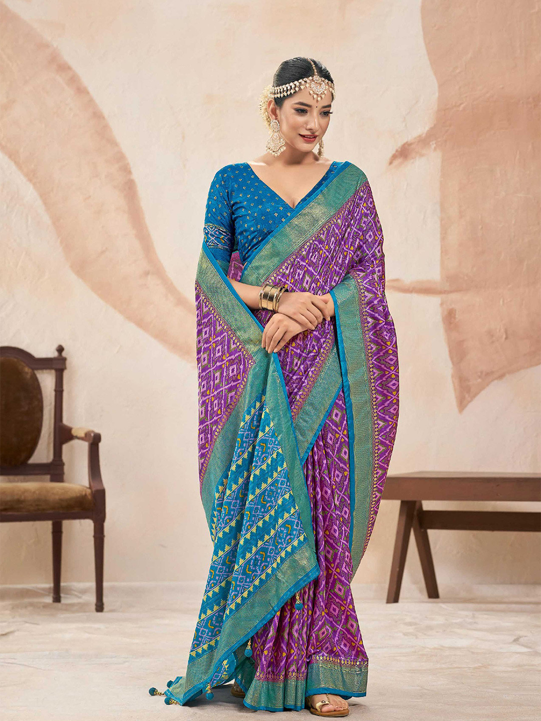 

Mitera Lavender & Blue Ethnic Motifs Printed Zari Patola Saree