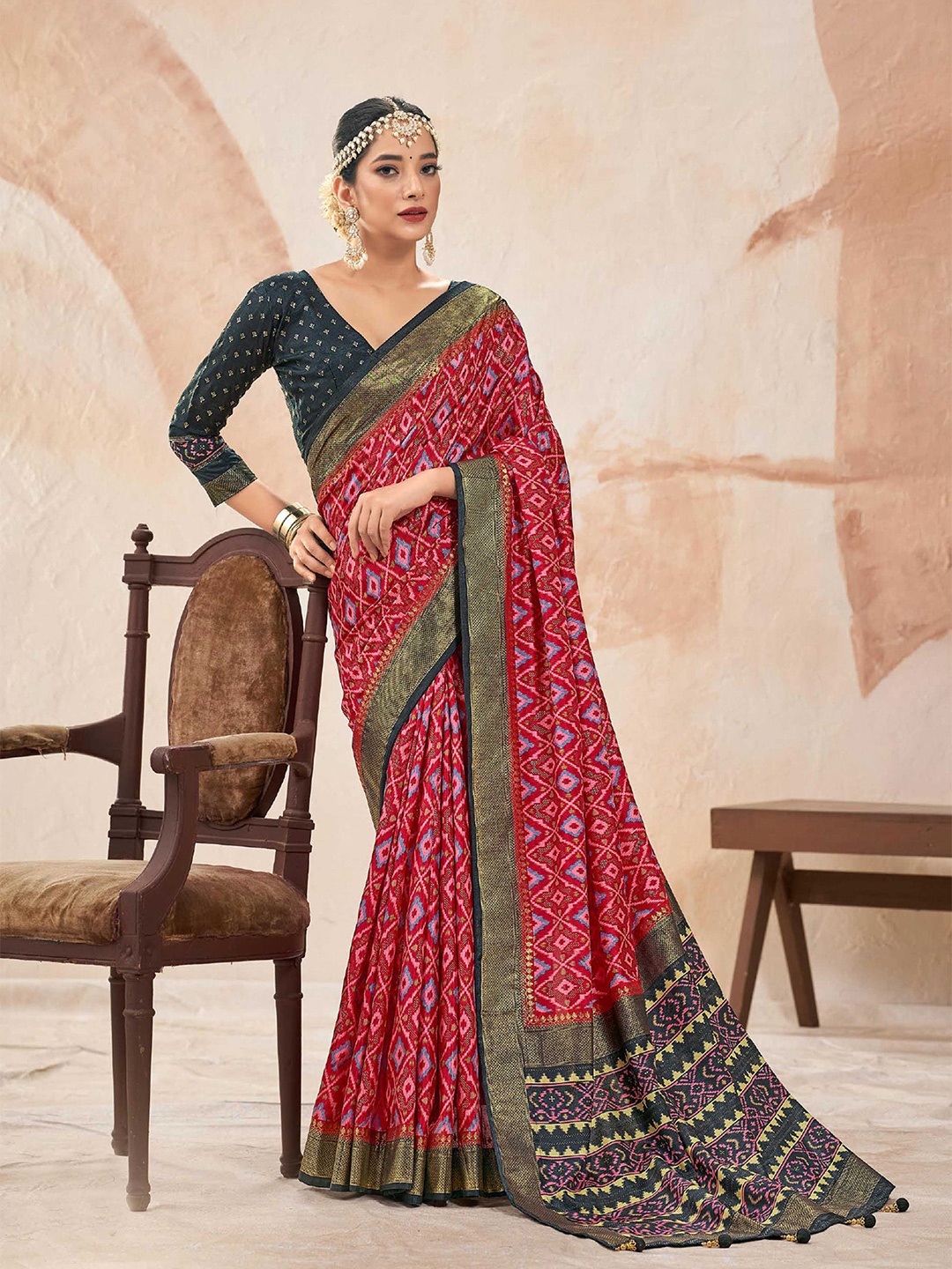 

Mitera Red & Blue Ethnic Motifs Printed Zari Patola Saree