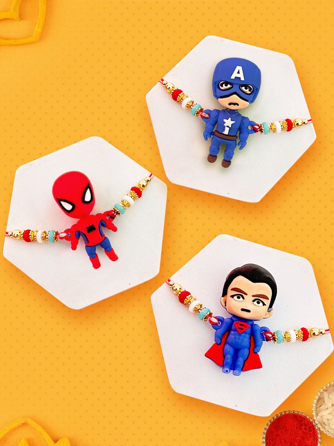 

TIED RIBBONS Kids Set of 3 Superheros Metal Rakhis With Greeting Card, Red