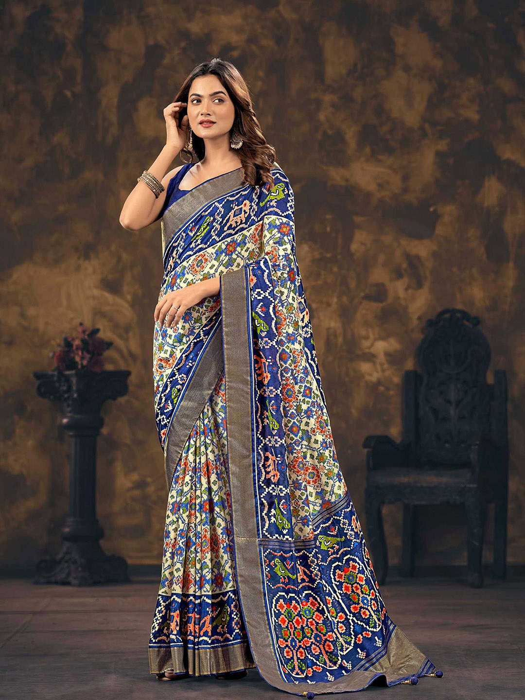 

Mitera Navy Blue & White Ethnic Motifs Printed Zari Silk Blend Patola Saree