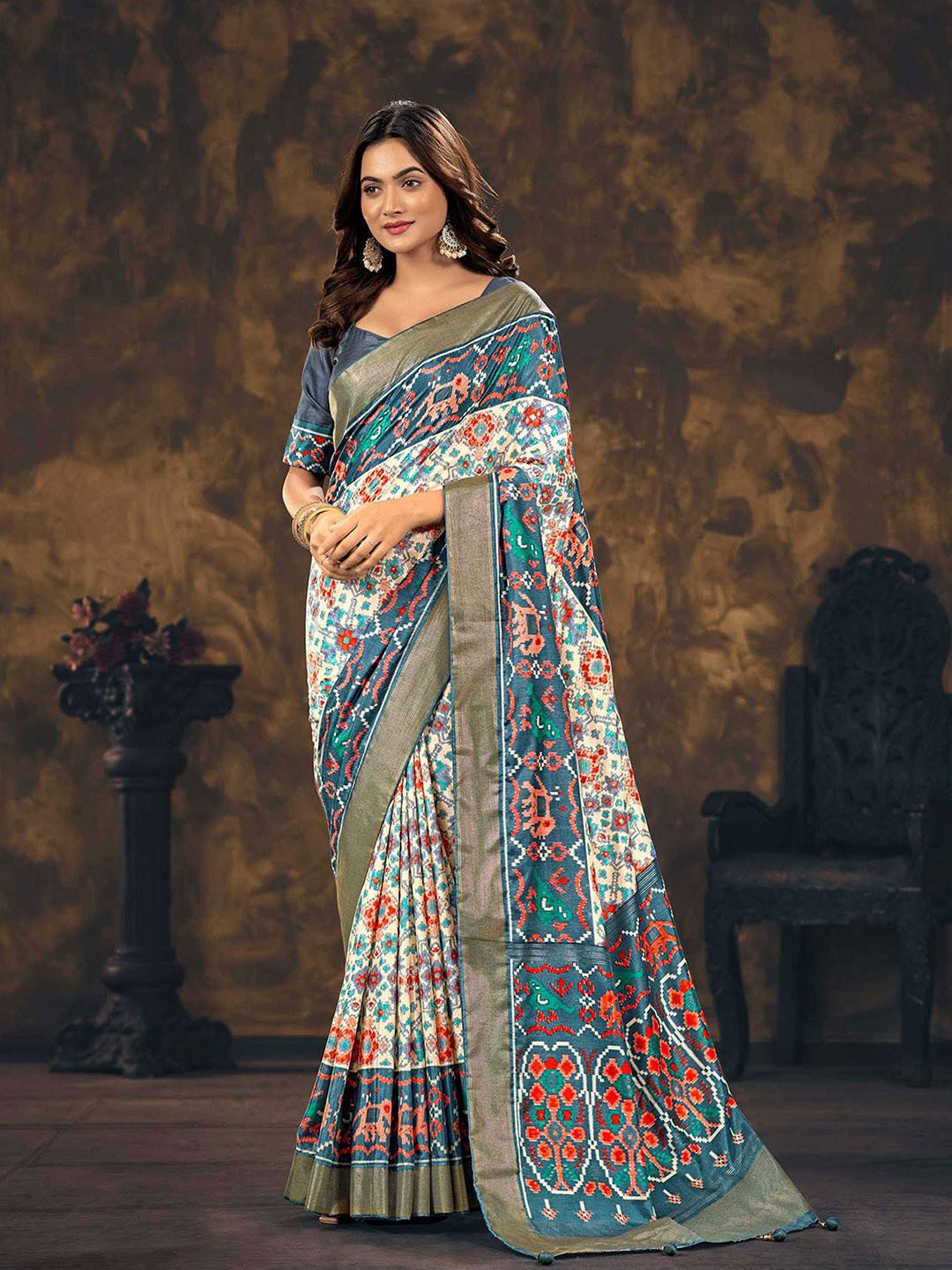 

Mitera Grey & White Ethnic Motifs Printed Zari Silk Blend Patola Saree