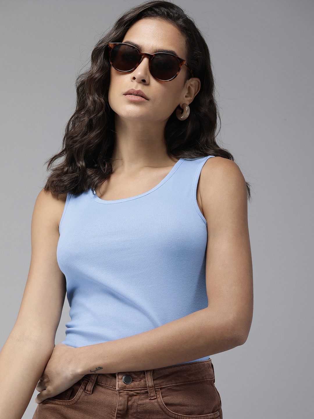 

Roadster Women Solid Tank Top, Blue