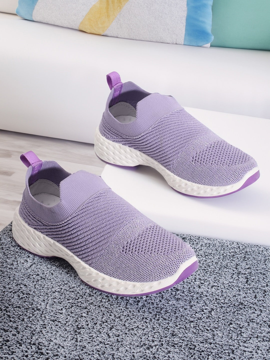

Carlton London sports Women Textured Lightweight Slip-On Sneakers, Lavender