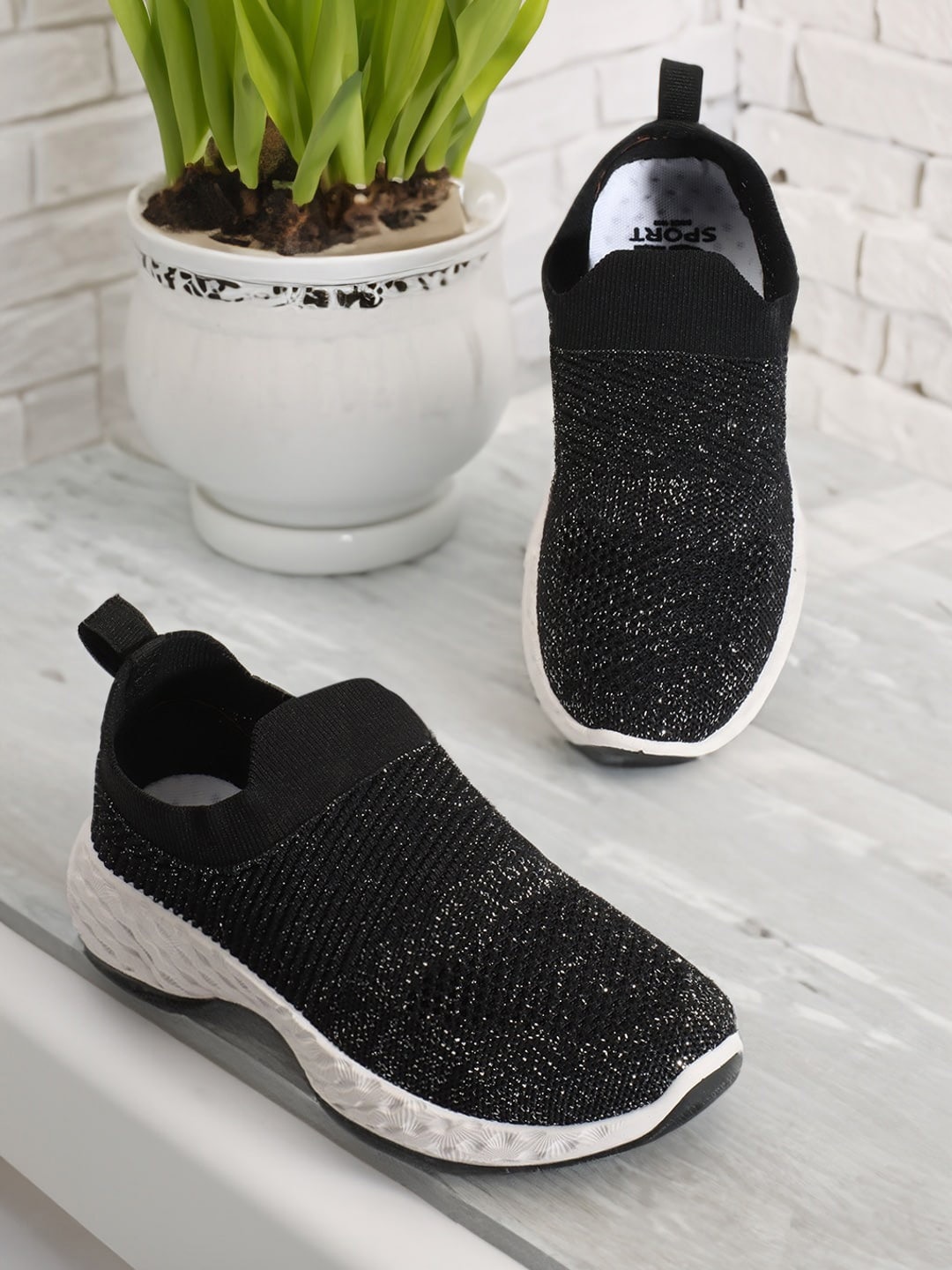

Carlton London sports Women Textured Lightweight Slip-On Sneakers, Black