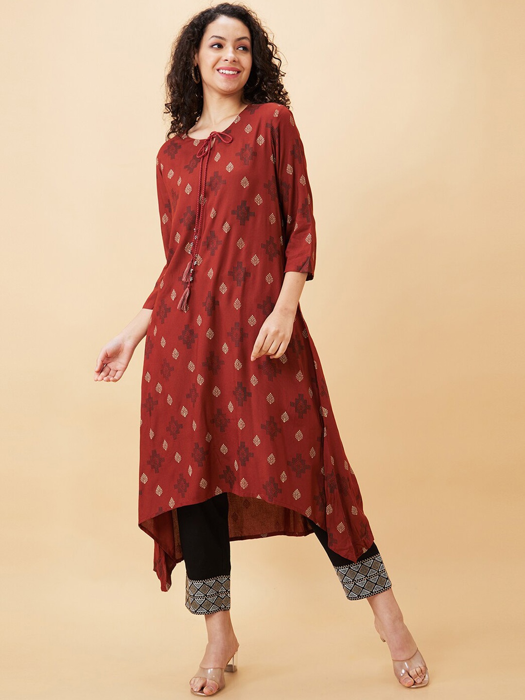 

Globus Rust Ethnic Motifs Printed Tie-Ups Neck A-Line Regular Kurta