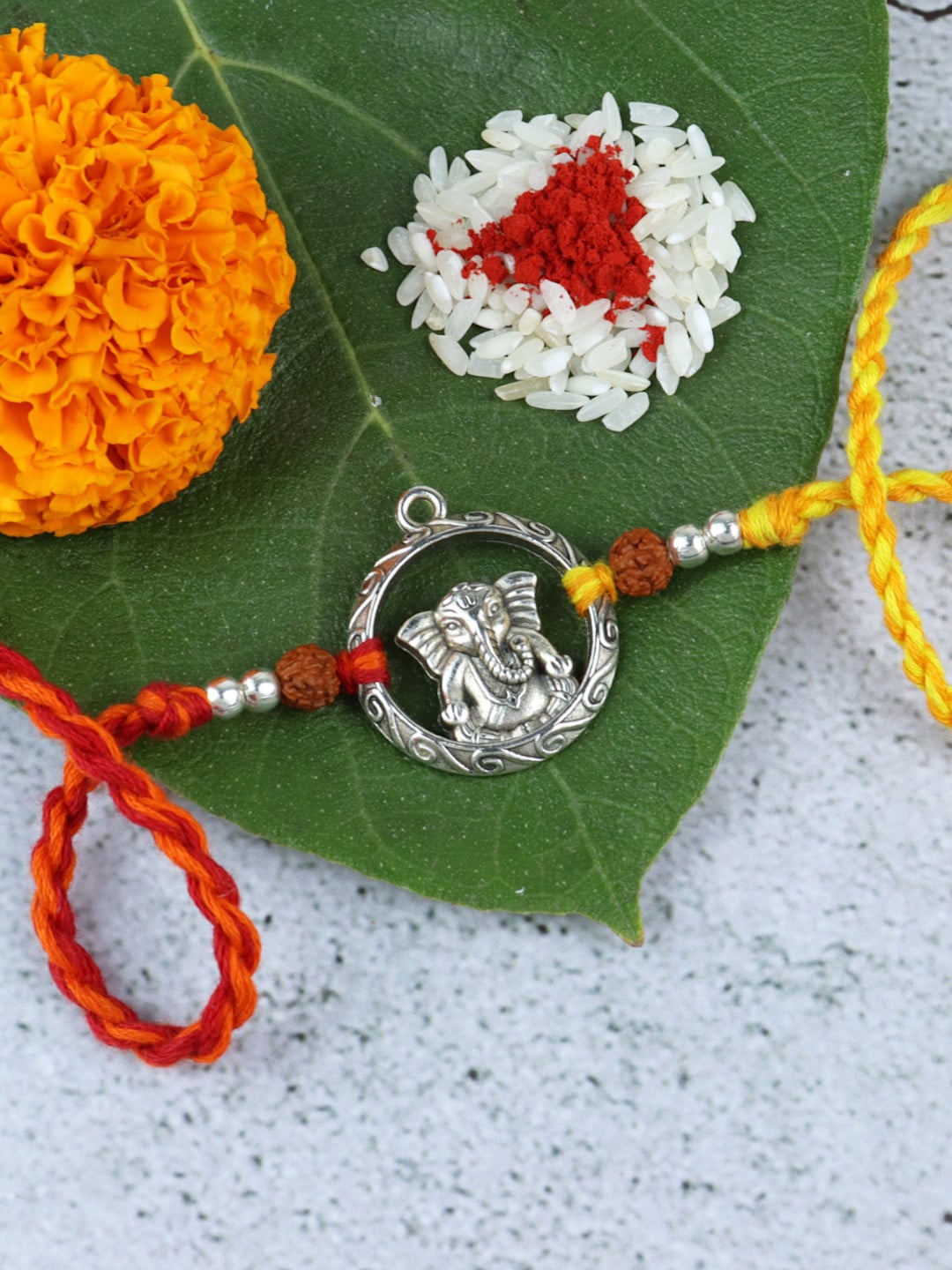 

Asthetika Men Lord Ganesha Charm Rakhi, Silver
