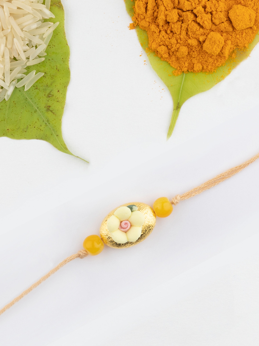 

The Magic Wand Beaded Flower Charm Rakhi, Yellow