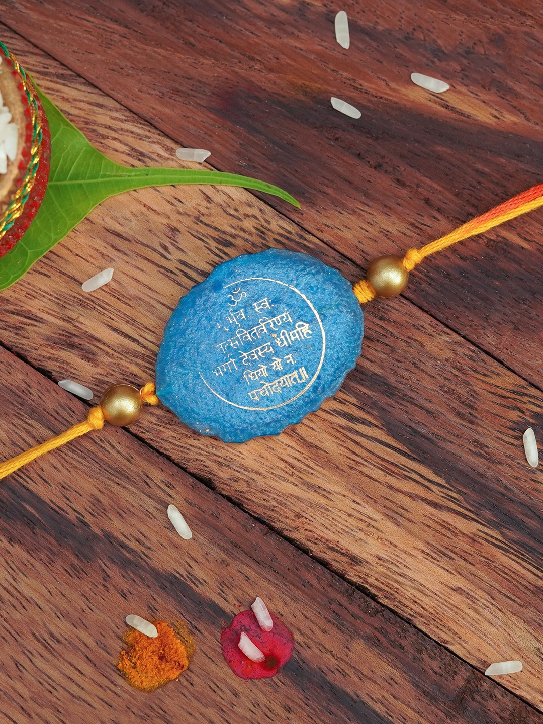 

The Magic Wand Mantra Printed Charm Rakhi, Blue