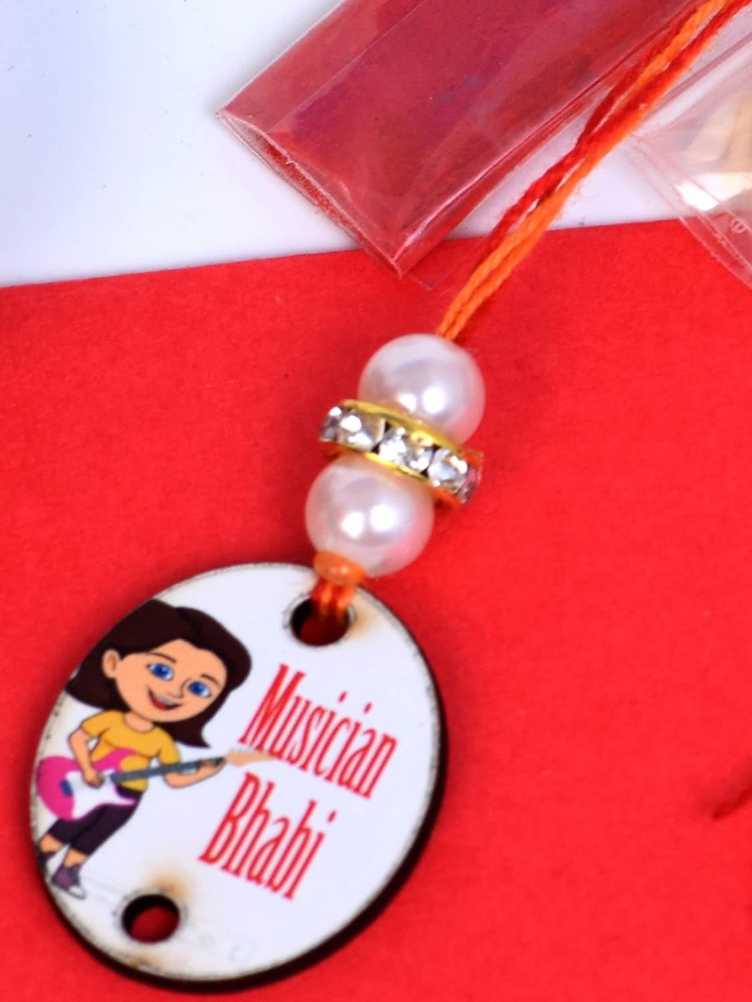 

The Magic Wand Musician Charm Rakhi, White
