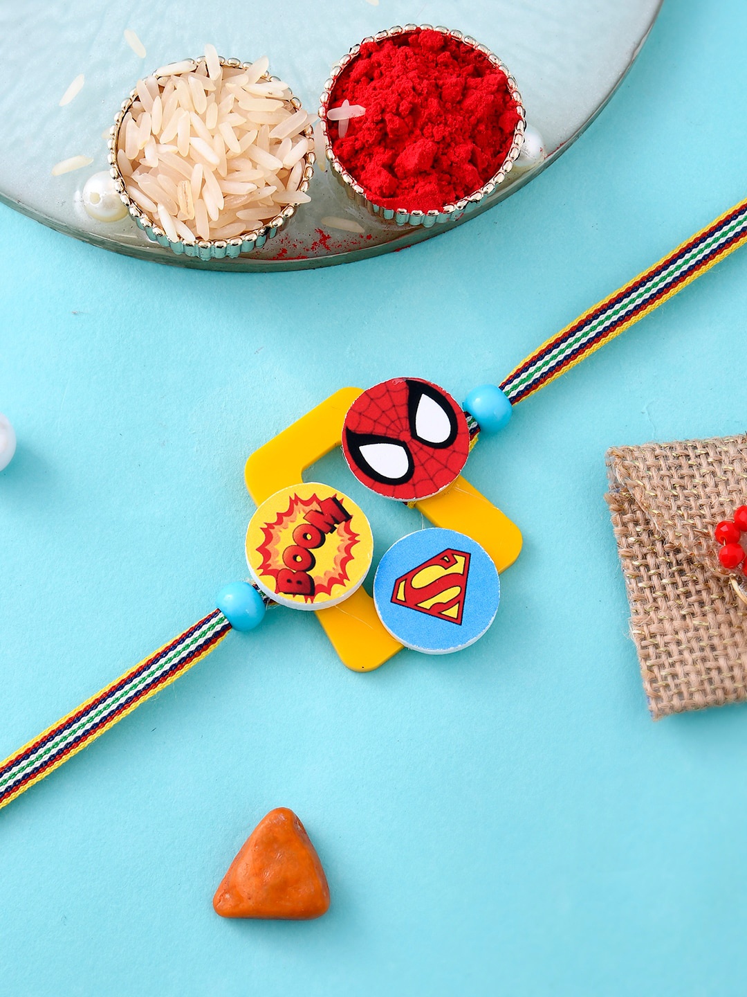 

Aapno Rajasthan Kids Superman & Spiderman Designed Rakhi With Roli Chawal & Greeting Card, Red