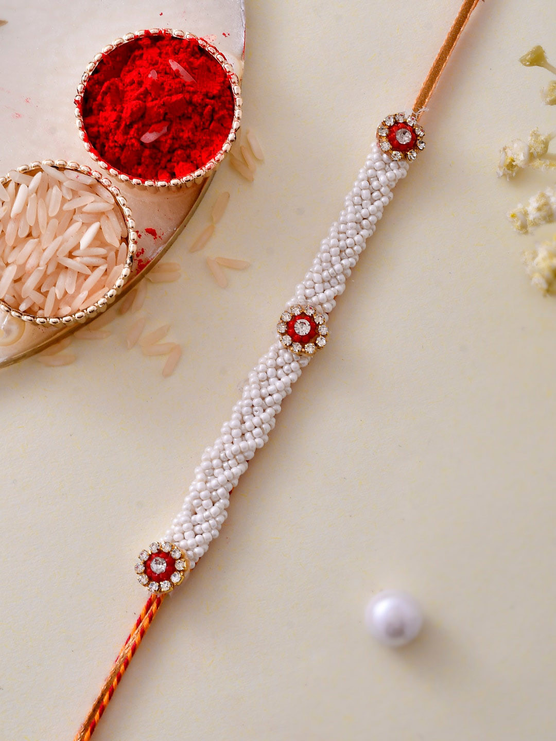 

Aapno Rajasthan Men Stone Studded & Beaded Rakhi With Roli Chawal & Greeting Card, White