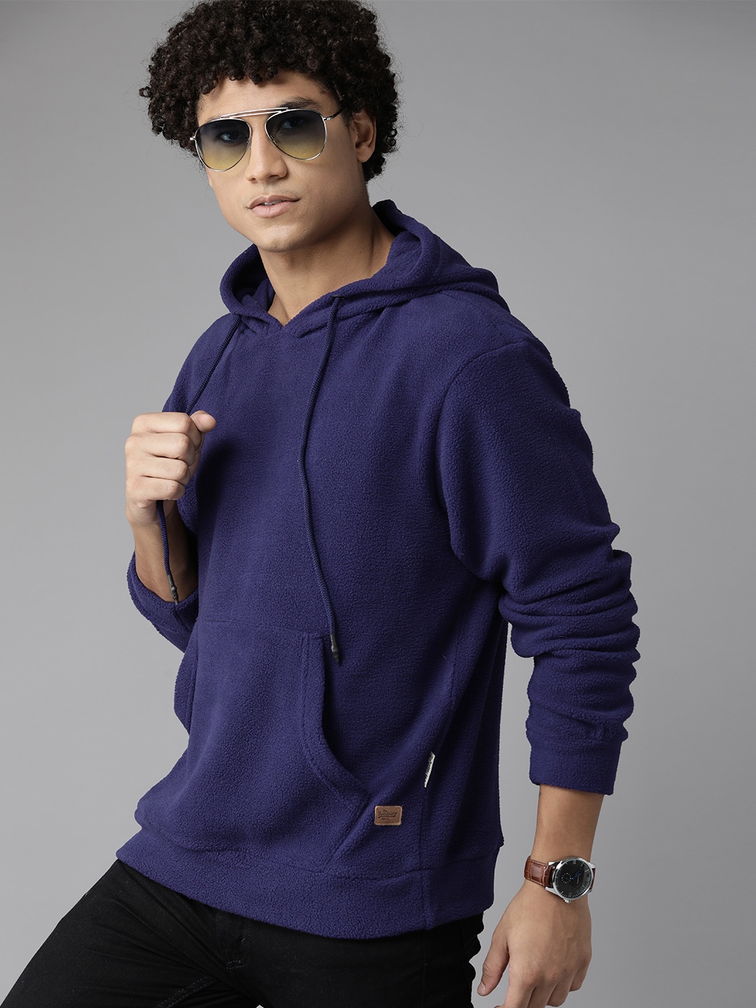 

Roadster Men Solid Hooded Sweatshirt, Blue