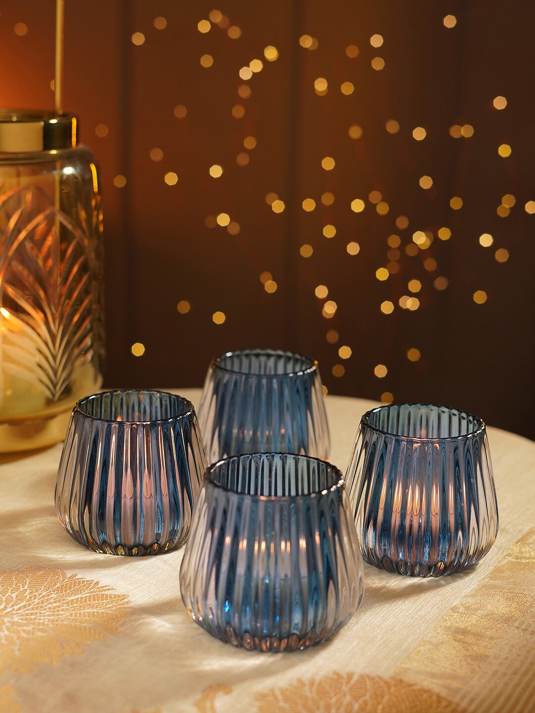 

Pure Home and Living Blue 4 Pieces Textured Glass T-Light Candle Holders