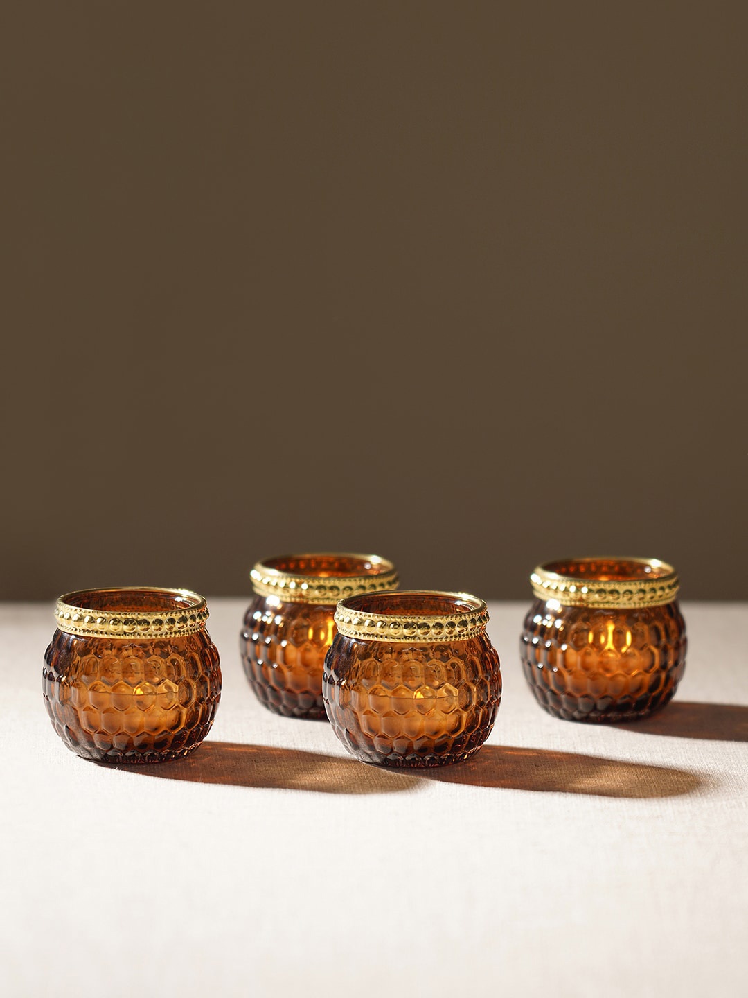 

Pure Home and Living Brown 4 Pieces Honeycomb Texture T-Light Holders