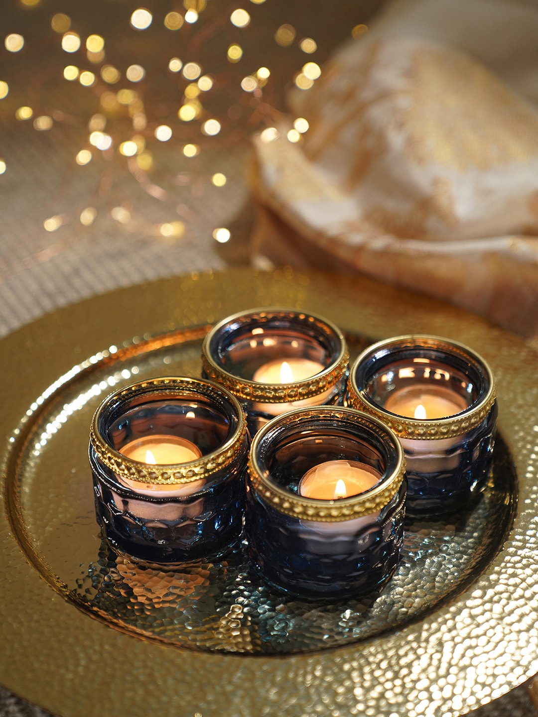 

Pure Home and Living Blue 4 Pieces Honeycomb Textured Candle Holders
