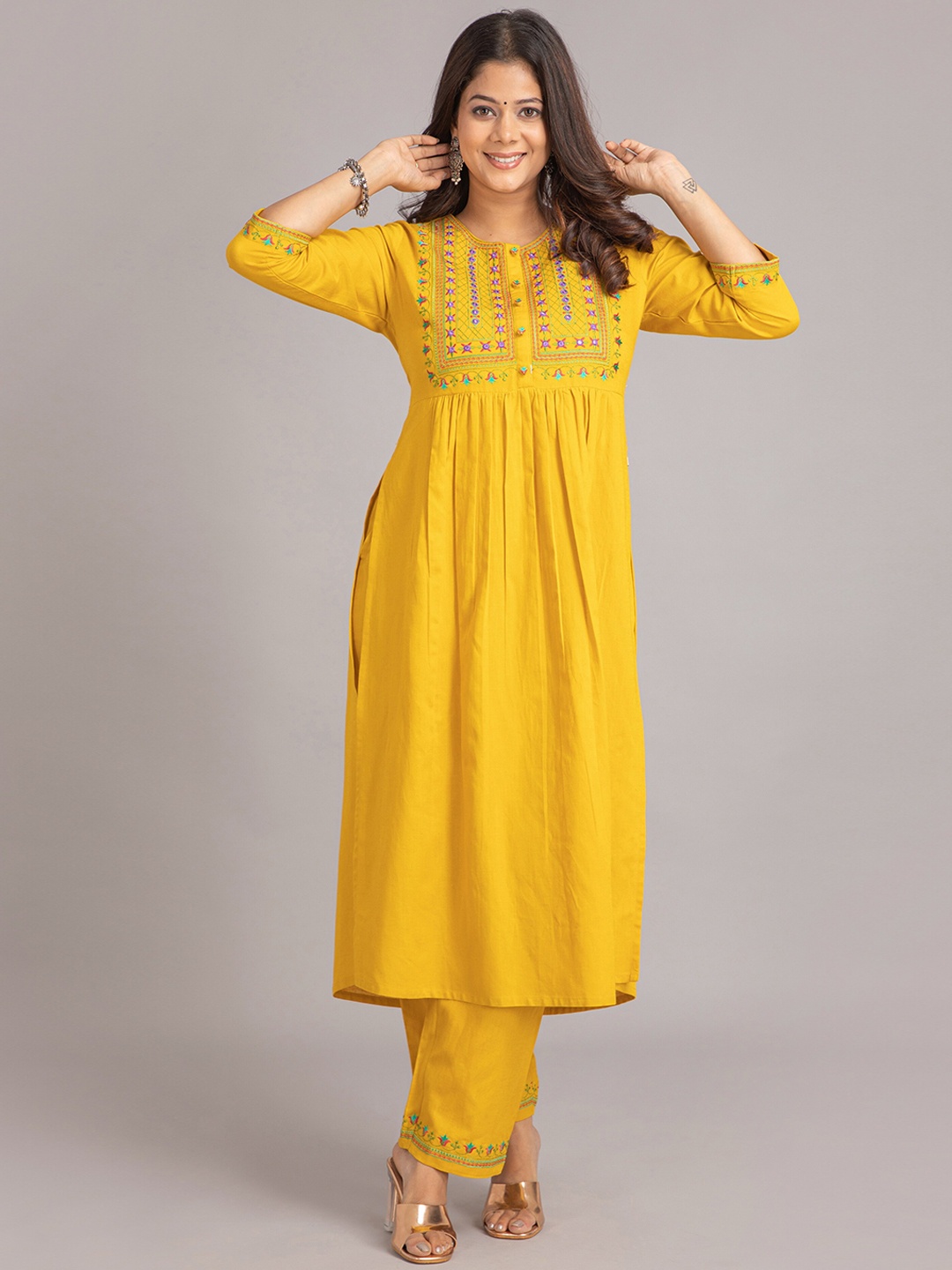 

SUTI Ethnic Motifs Embroidered Mirror Work Detail A-Line Kurta with Trousers, Yellow