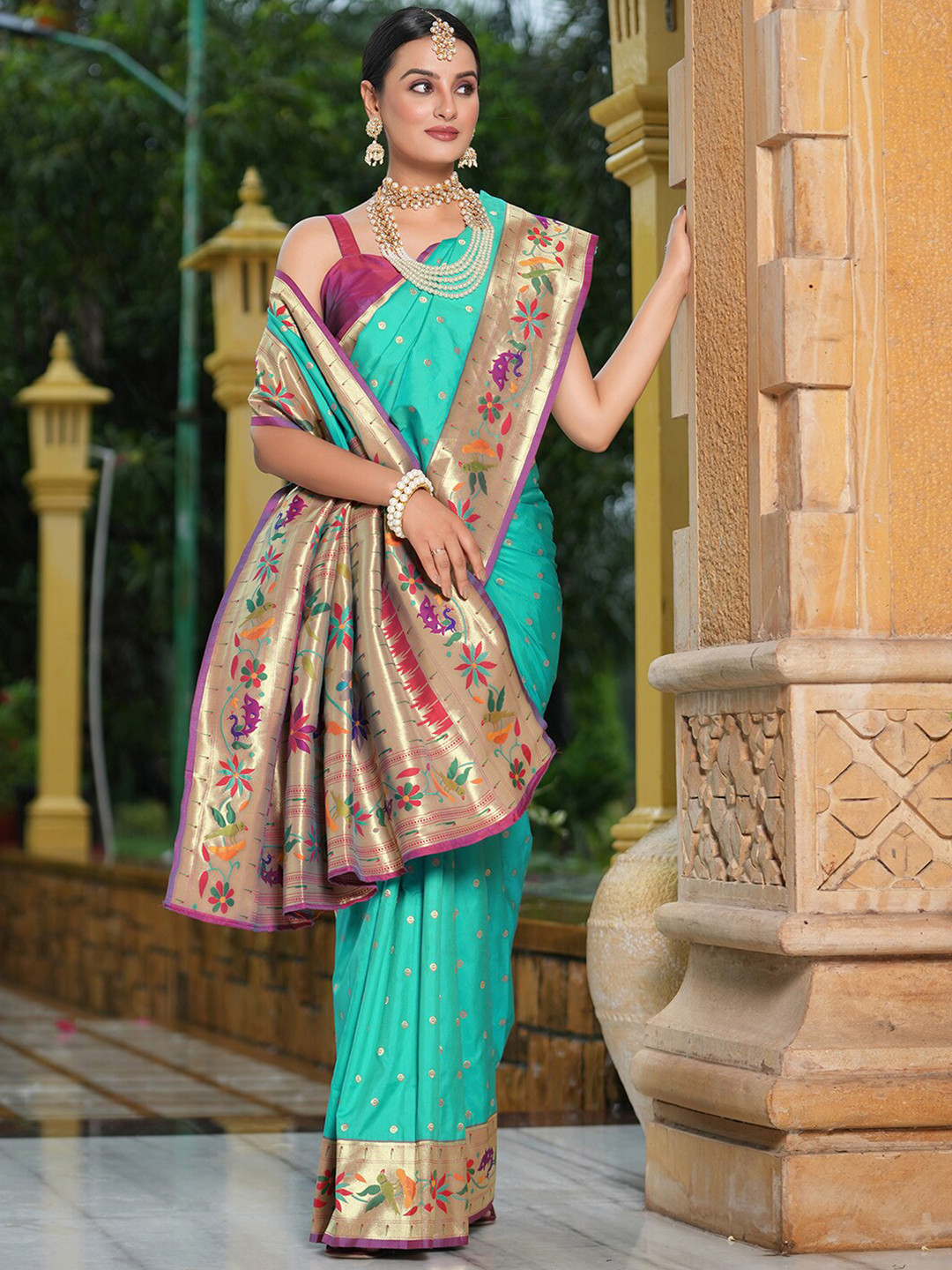 

Satrani Turquoise Blue & Purple Woven Design Zari Paithani Saree