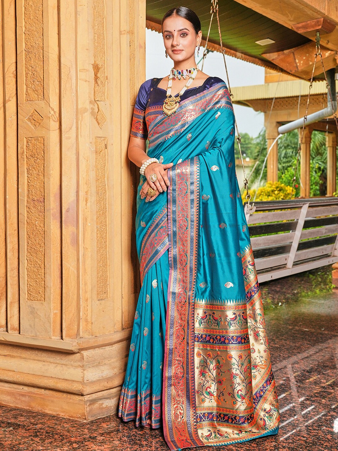 

Satrani Blue & Green Ethnic Motifs Woven Design Zari Paithani Saree