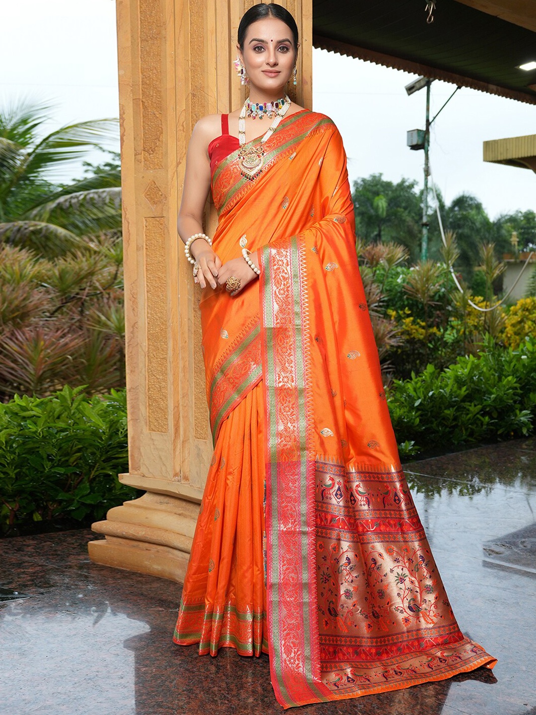 

Satrani Orange & Green Ethnic Motifs Woven Design Zari Paithani Saree