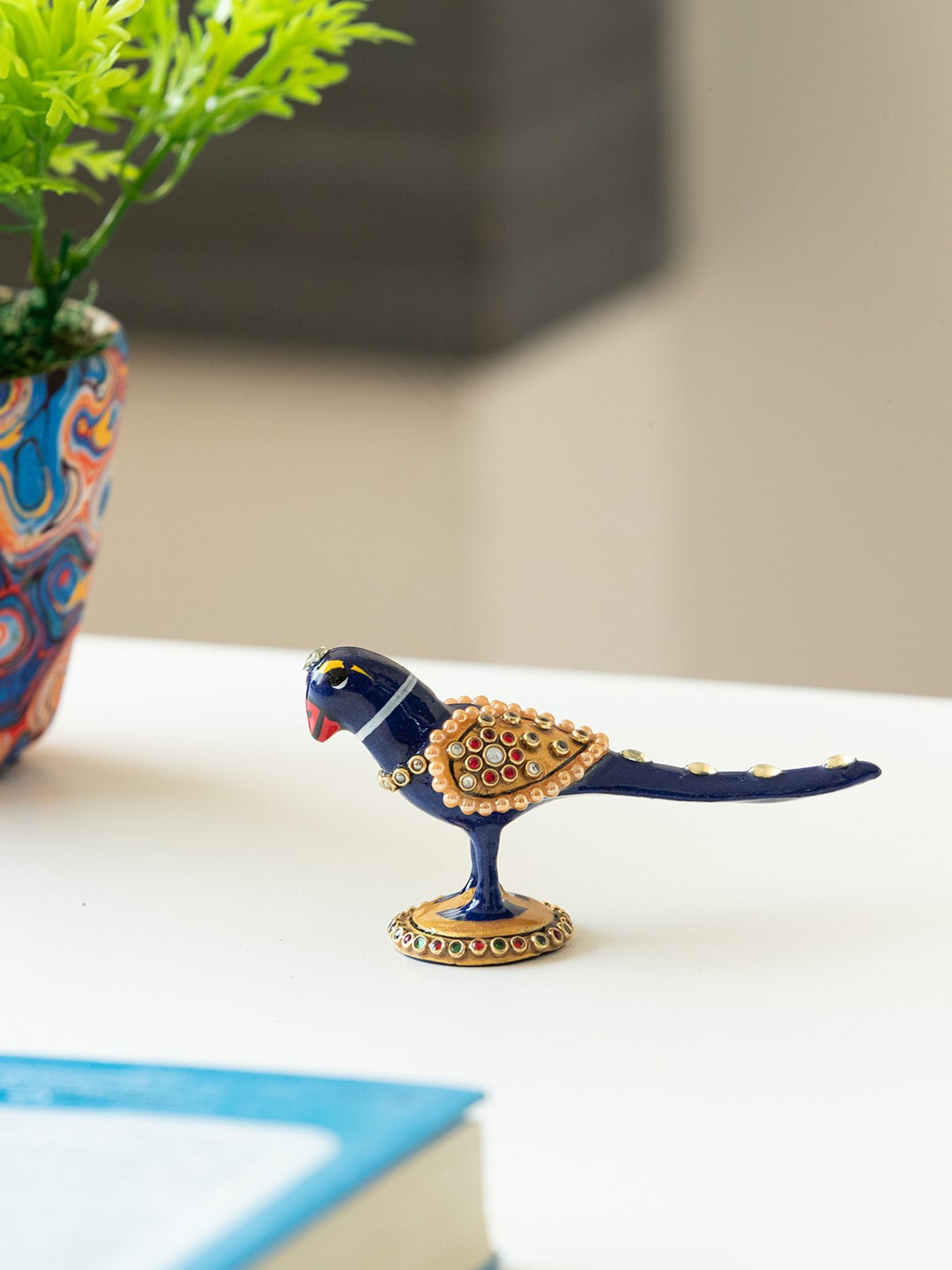 

ExclusiveLane Blue & Beige Singing Parrot Meenakari Showpiece