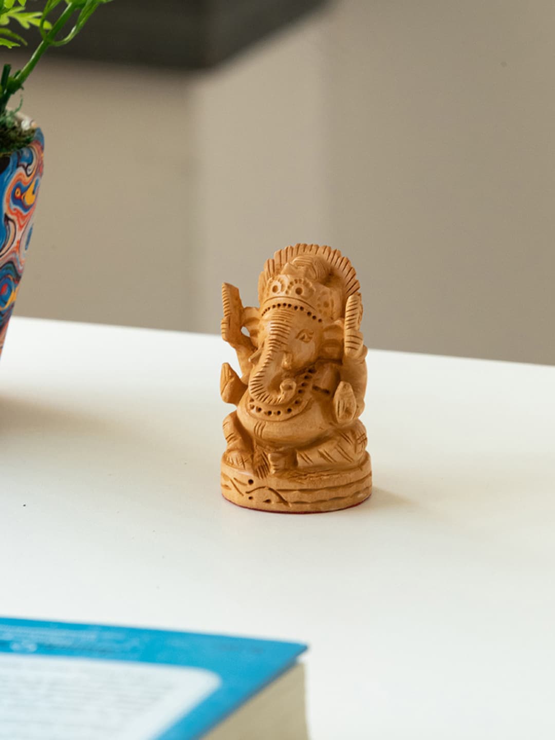 

ExclusiveLane Brown Divine Ganesha Showpiece
