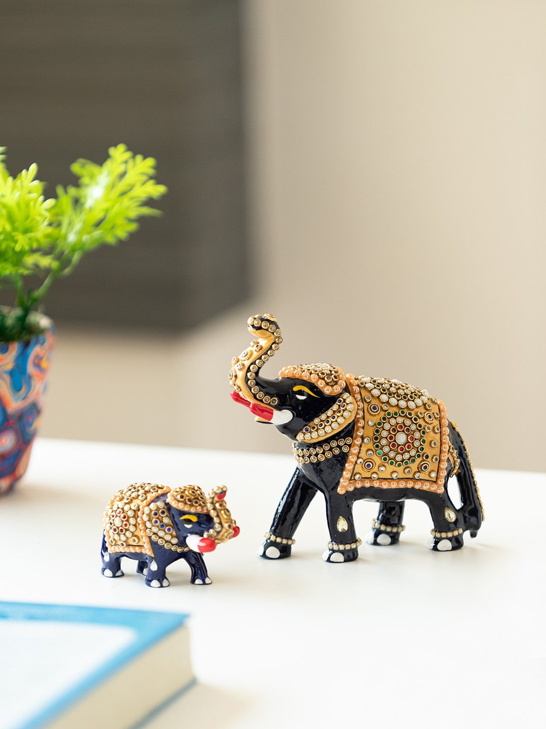 

ExclusiveLane Blue & Beige 2 Pieces Meenakari Elephant Family Showpieces
