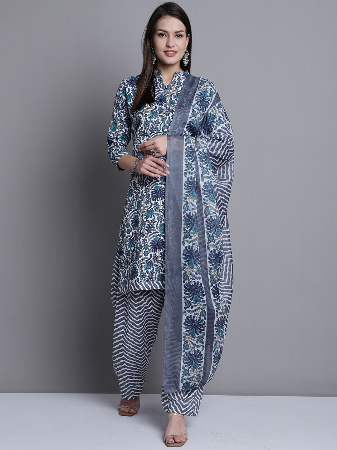 

Rajnandini Ethnic Motifs Printed Mandarin Collar Kurti With Salwar & Dupatta, White