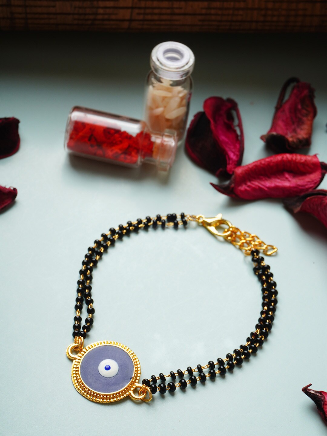 

Ferosh Gold-Plated Evil Eye Mangalsutra Beads Rakhi