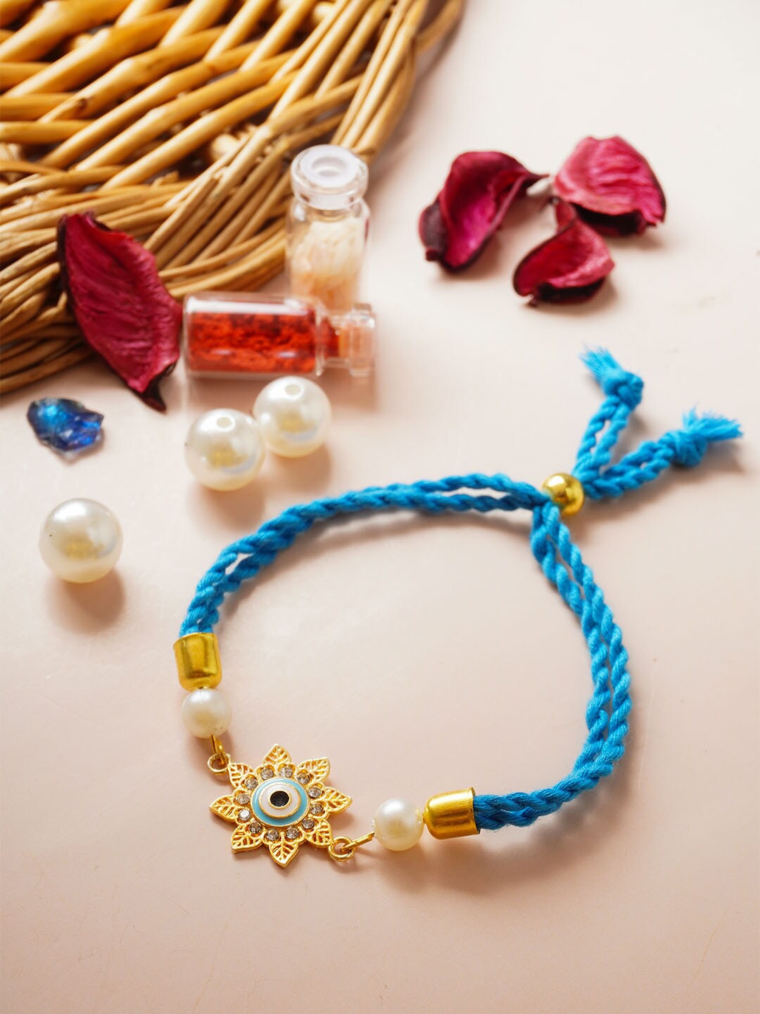 

Ferosh Flower Evil Eye Rakhi, Blue