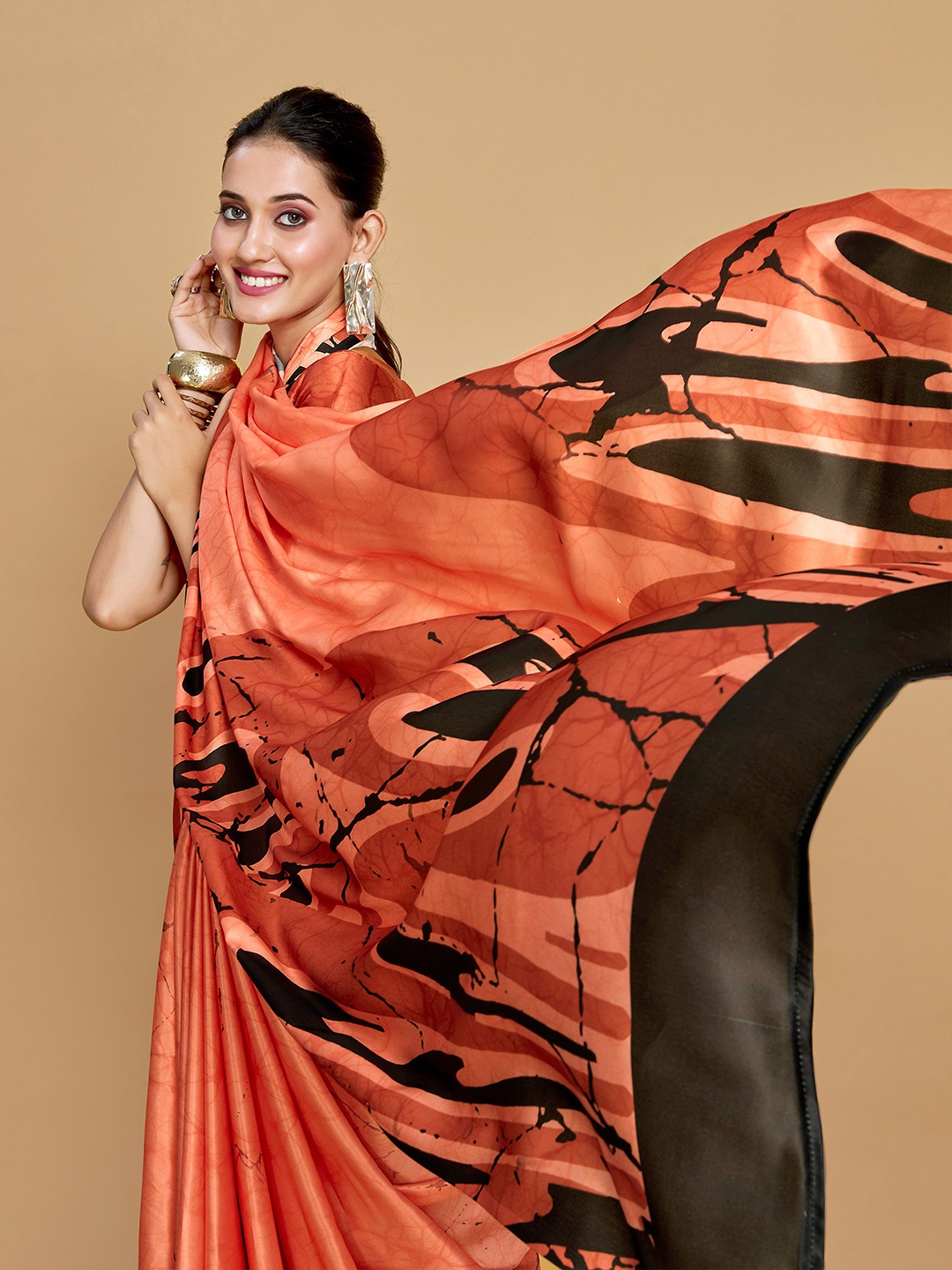 

Sangria Peach-Coloured Abstract Printed Satin Saree