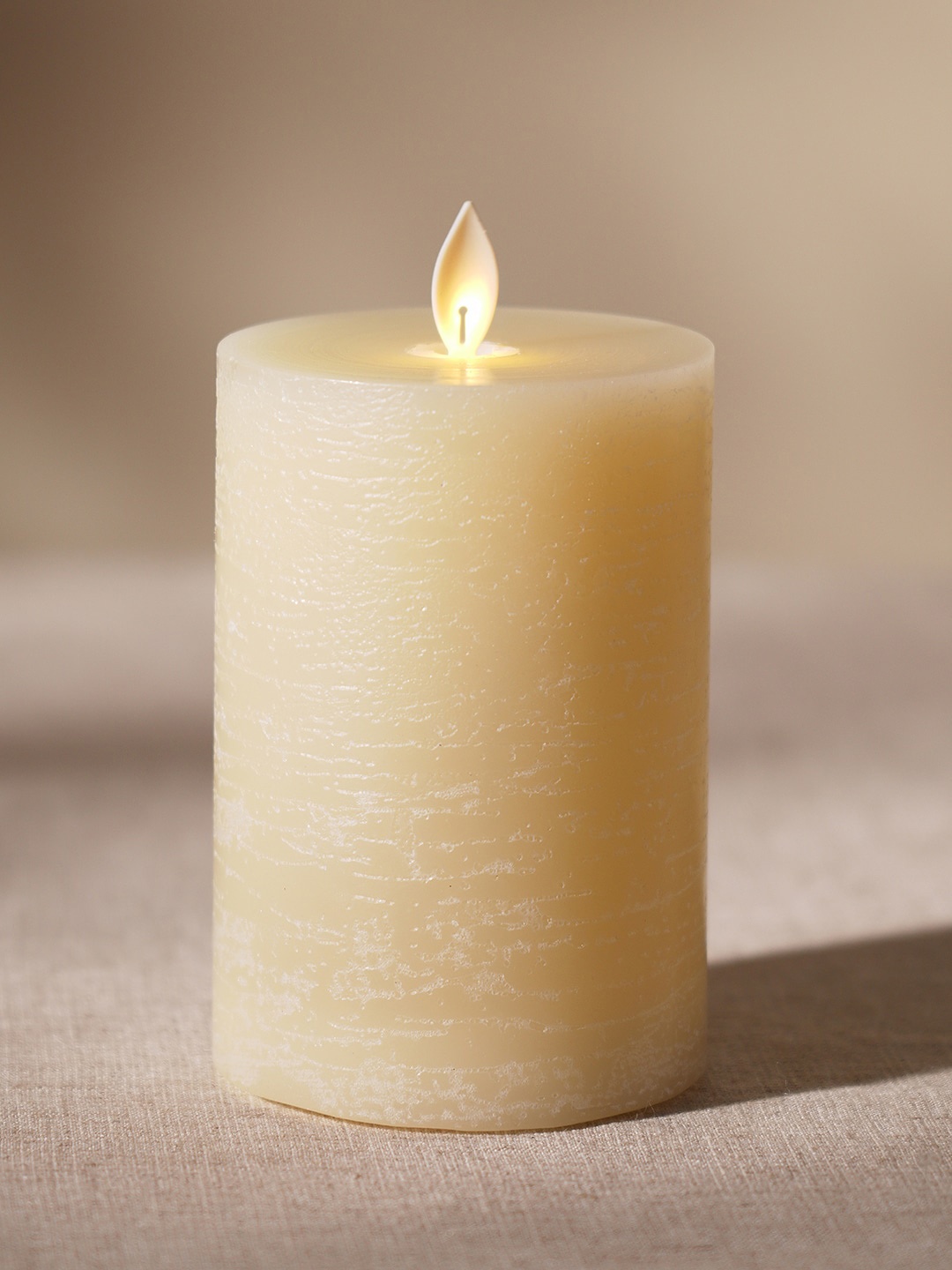 

Pure Home and Living Beige Textured LED Flickering Flame Candle