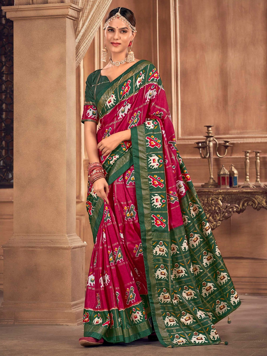 

Mitera Pink Ethnic Motifs Woven Design Patola Saree