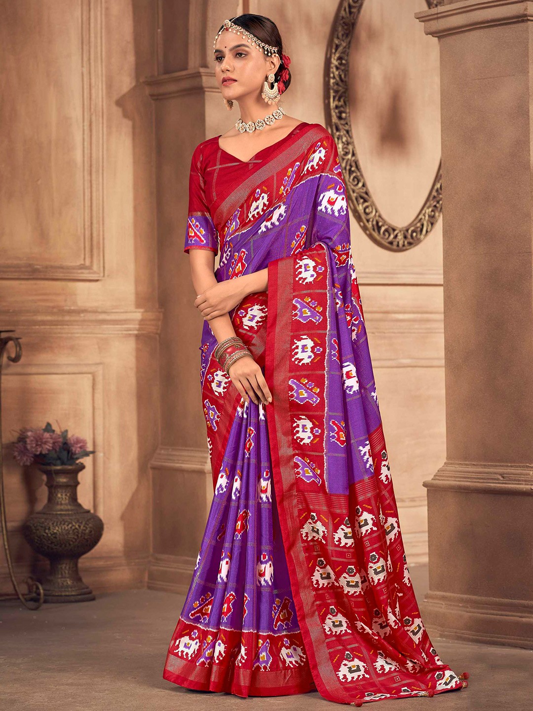 

Mitera Purple Ethnic Motifs Woven Design Patola Saree