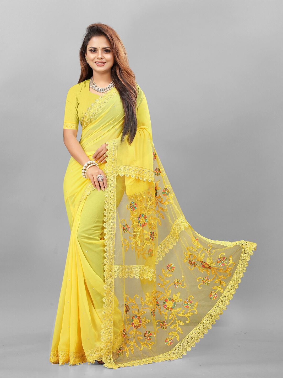 

APNISHA Floral Embroidered Beads & Stones Pure Georgette Saree, Yellow