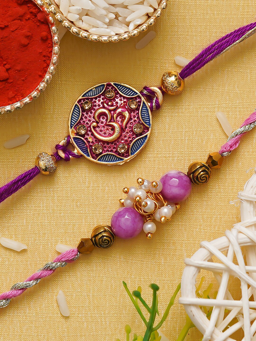 

eCraftIndia Set of 2 Om Symbol and Pearl Designer Rakhi Gift Set, Purple