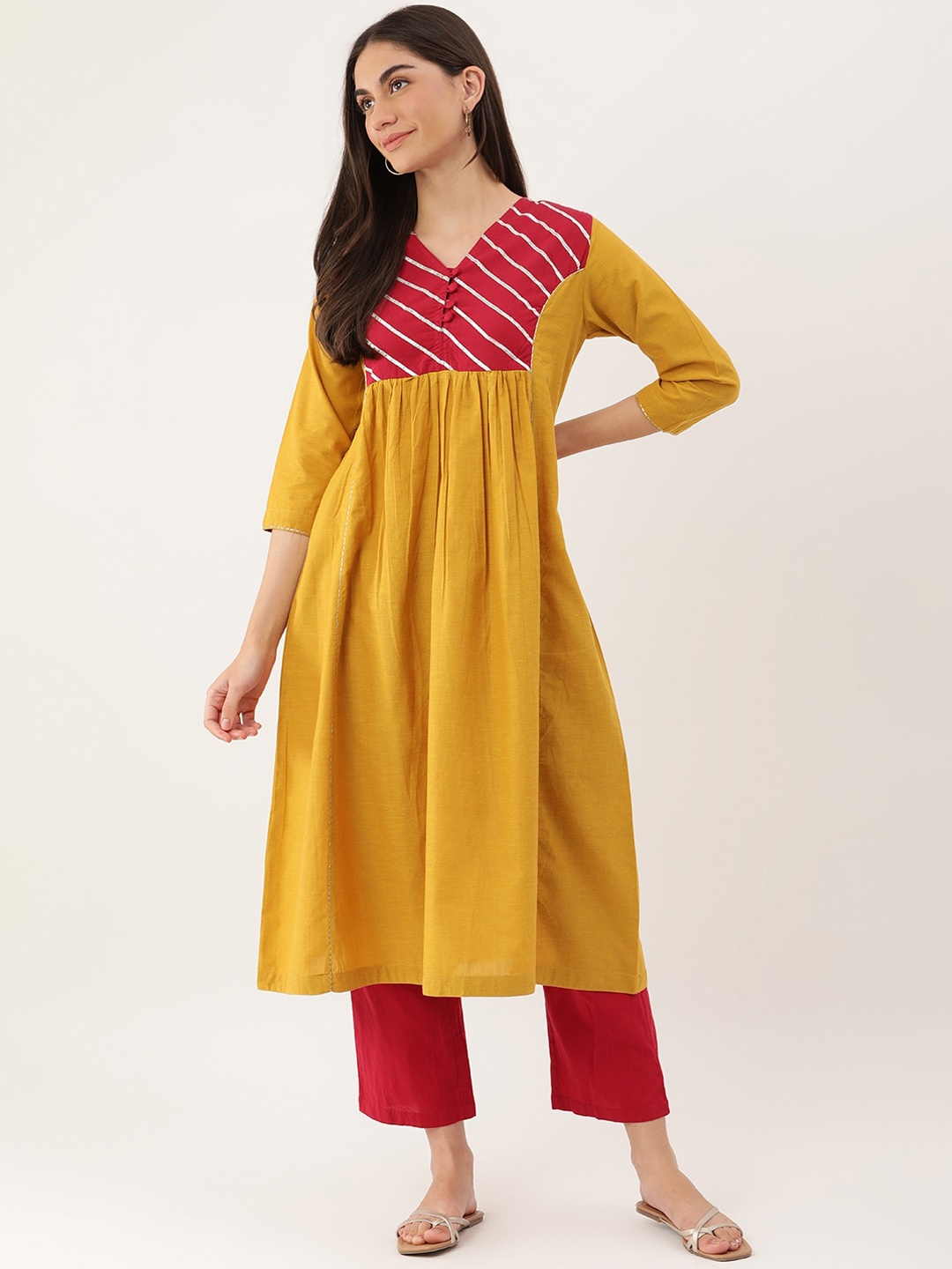 

Lokatita Yoke Design Flared Sleeves Thread Work Anarkali Kurta, Yellow