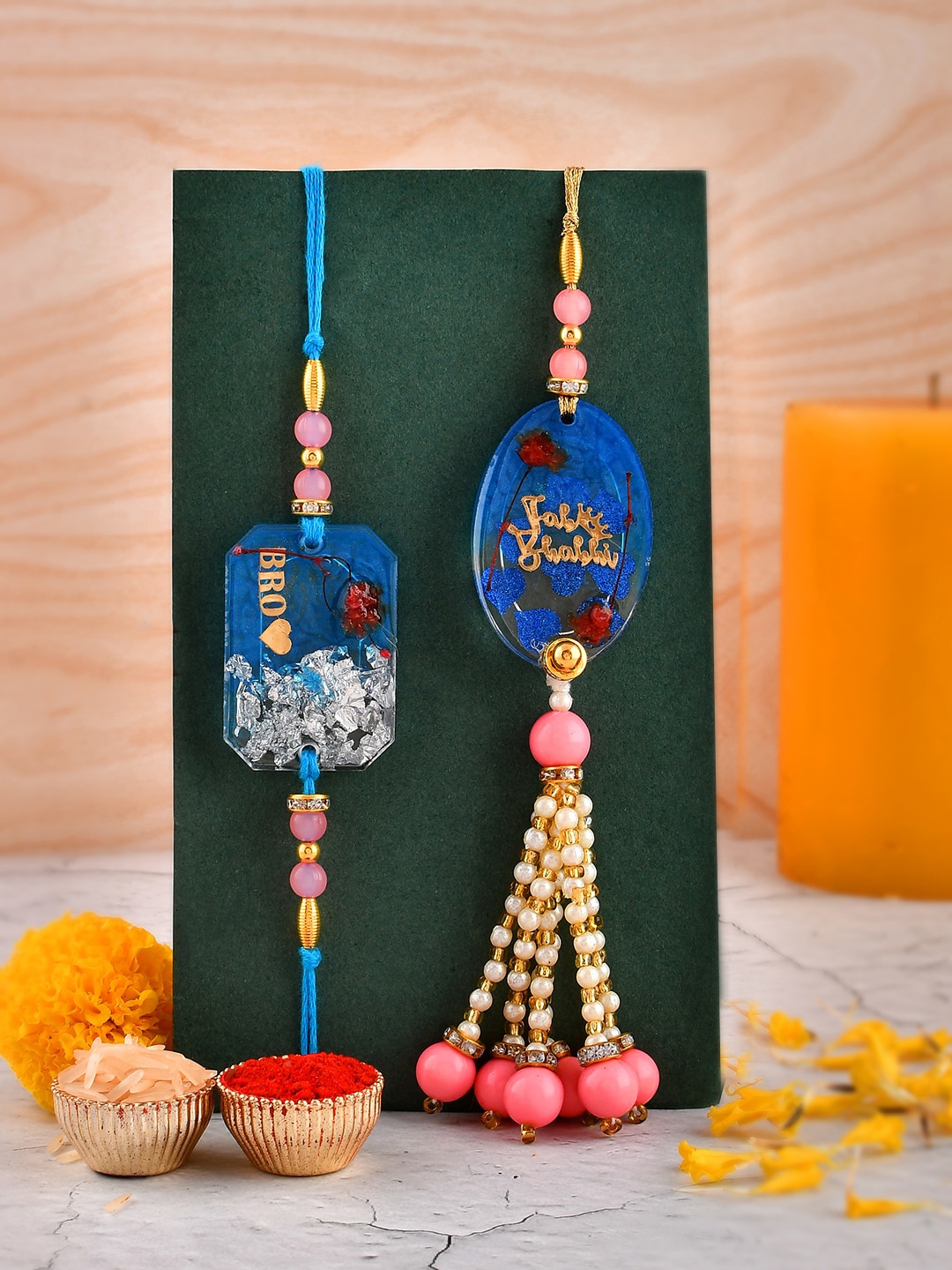 

Aapno Rajasthan Resin Elegant Rakhi Gift Set, Blue
