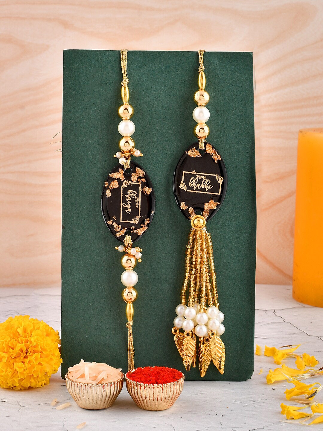 

Aapno Rajasthan Resin Crafted & Pearled Dazzling Rakhi Gift Set, Gold