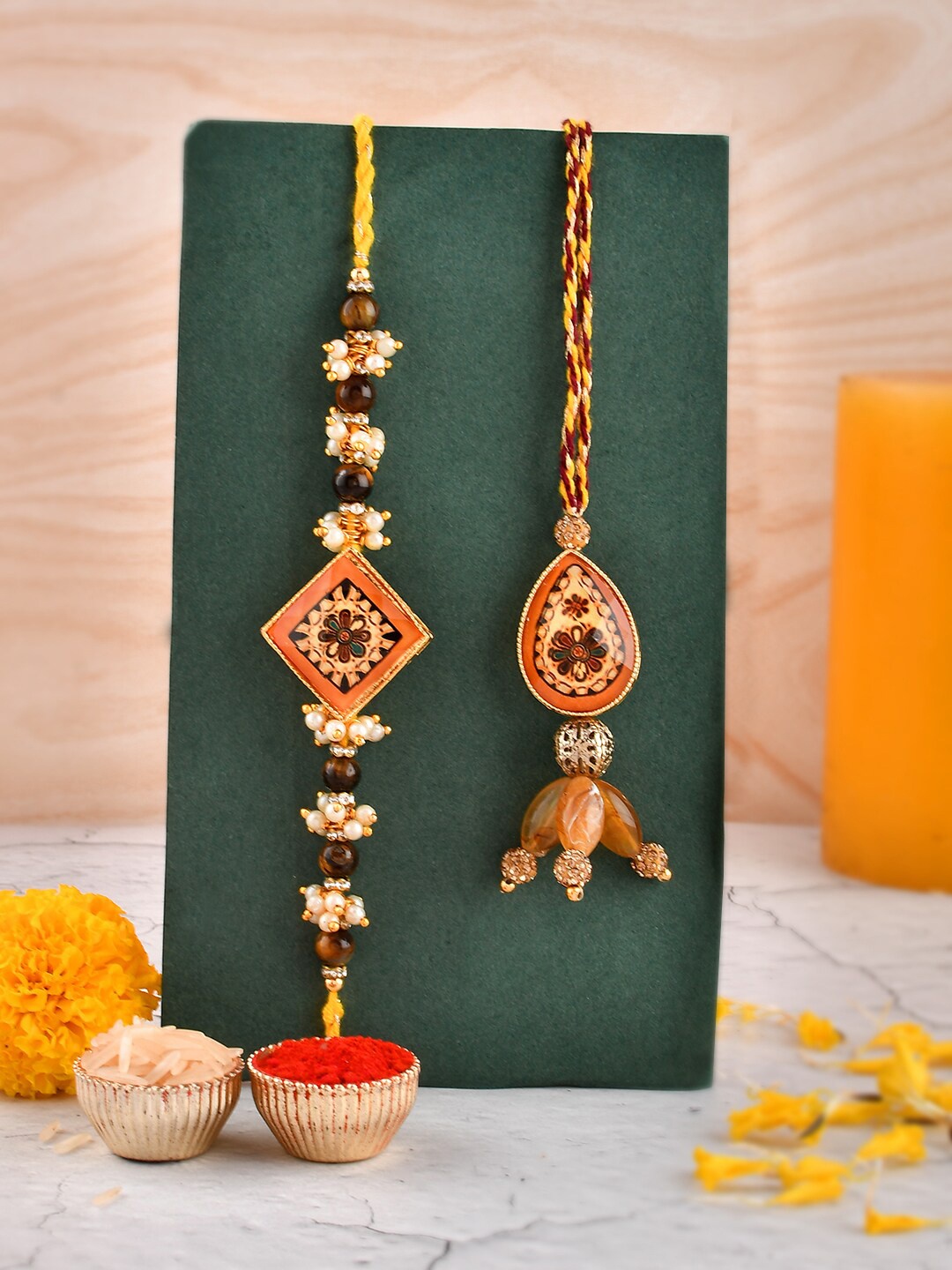 

Aapno Rajasthan Unisex Set of 2 Beaded Rakhi with Roli Chawal & Greetings Card, Brown