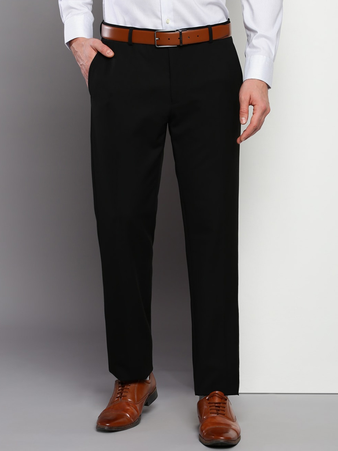 

Tommy Hilfiger Men Mid-Rise Formal Trousers, Black