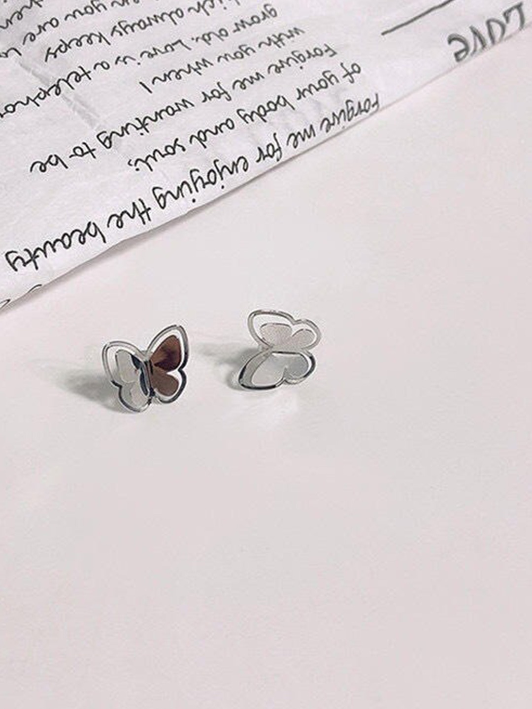 

Pinapes Silver Plated Butterfly Shaped Studs Earrings