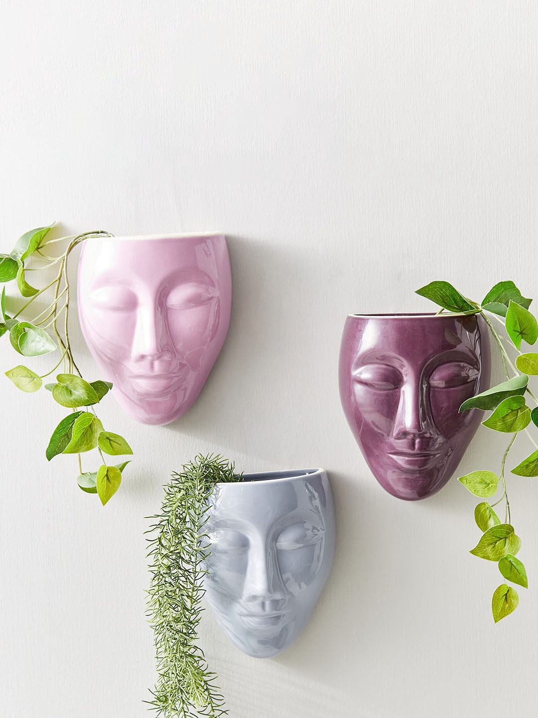 

Home Centre Purple Face Shaped Ceramic Planter