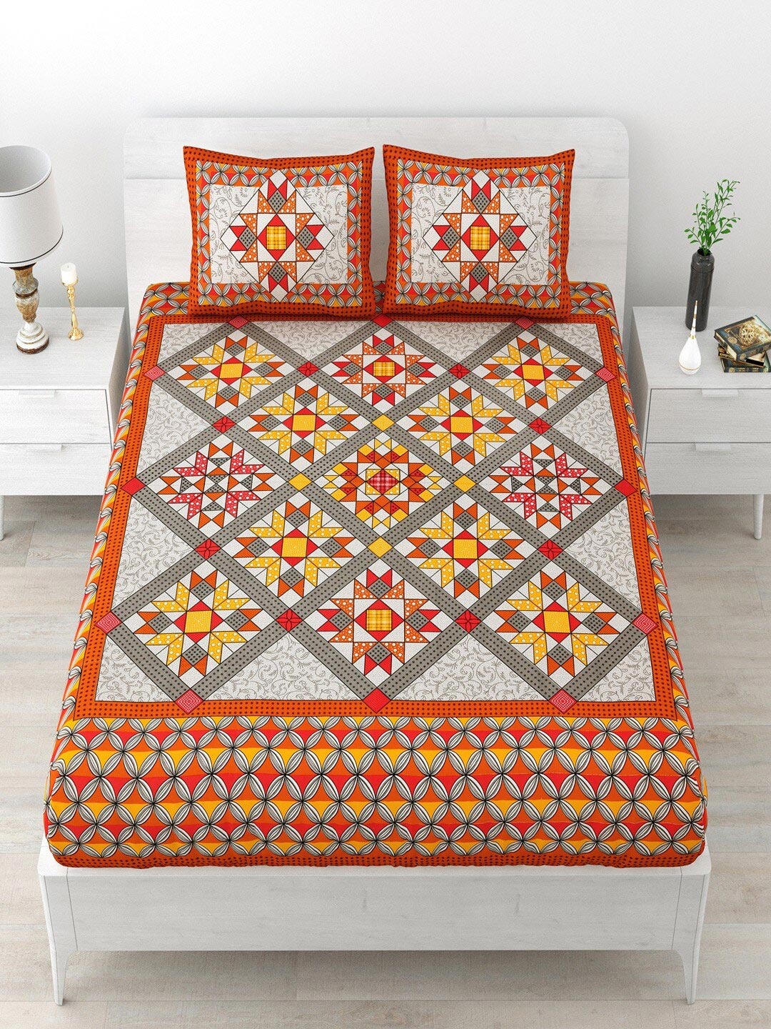 

UNIQCHOICE Orange & White Printed Cotton 120 TC Queen Bedsheet with 2 Pillow Covers