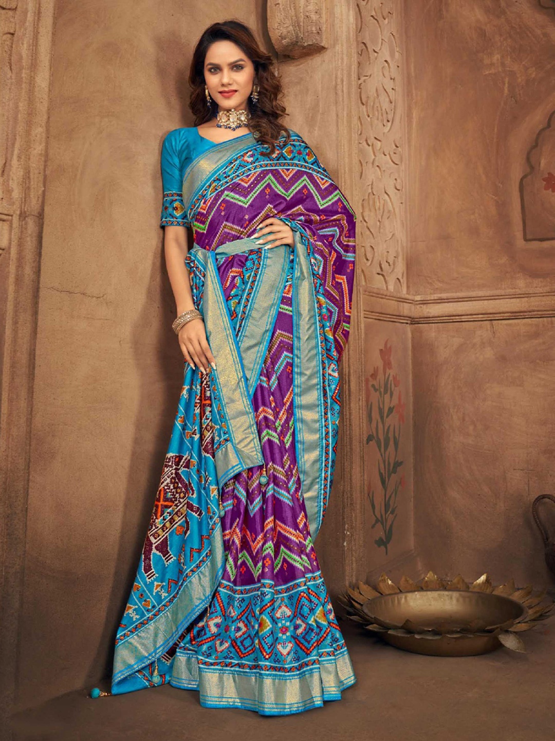 

Mitera Purple Geometric Printed Zari Detailed Patola Saree
