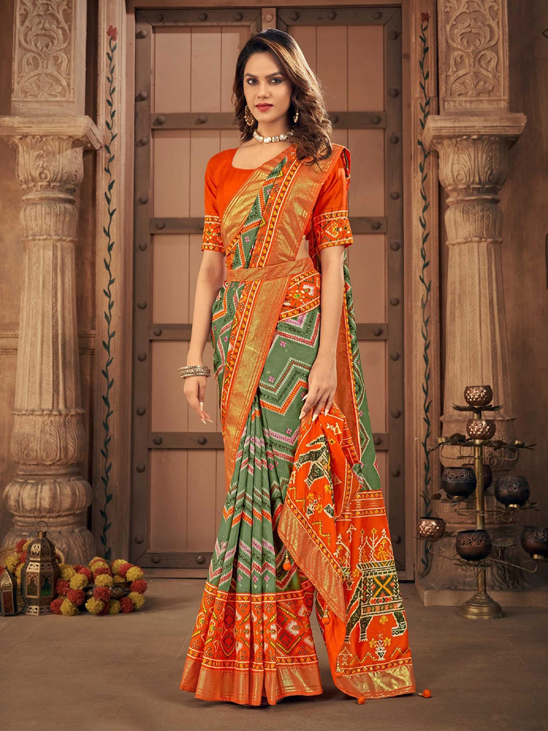 

Mitera Green Geometric Printed Zari Detailed Patola Saree
