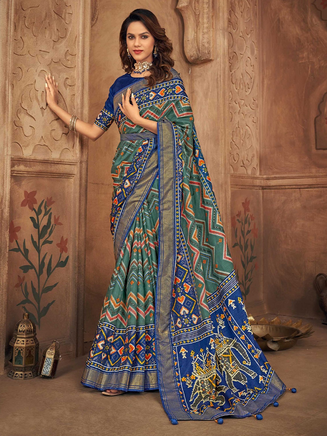 

Mitera Ethnic Motifs Zari Silk Blend Patola Saree, Blue
