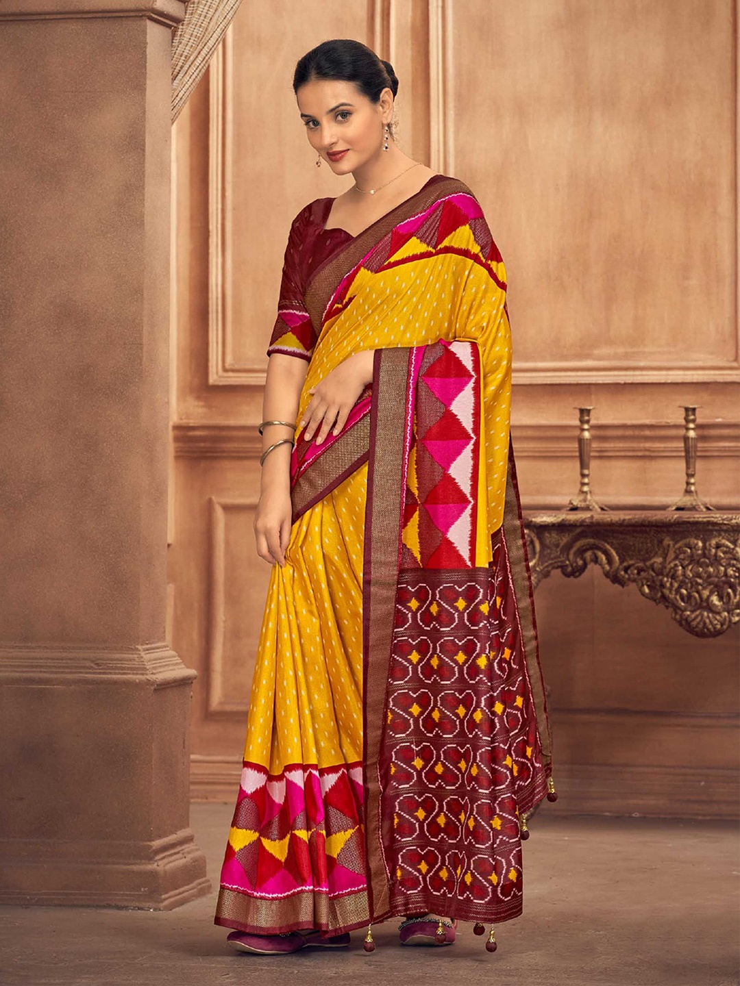 

Mitera Yellow Geometric Printed Patola Saree