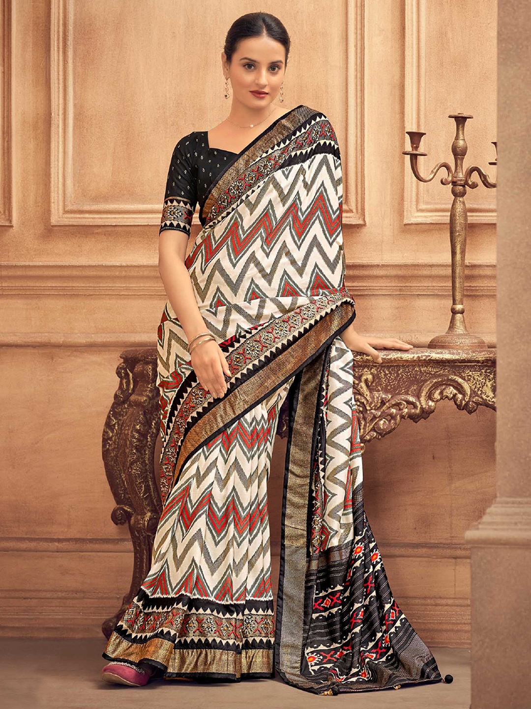 

Mitera Off White Geometric Printed Zari Detailed Patola Saree