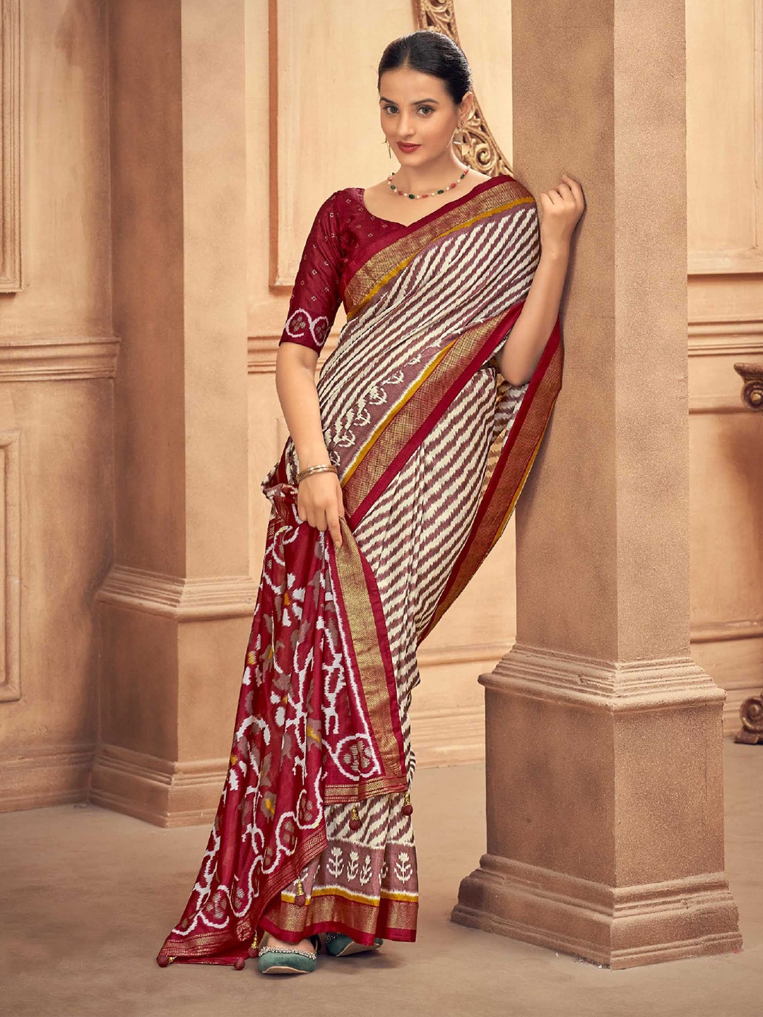 

Mitera Maroon Leheriya Printed Zari Detailed Patola Saree