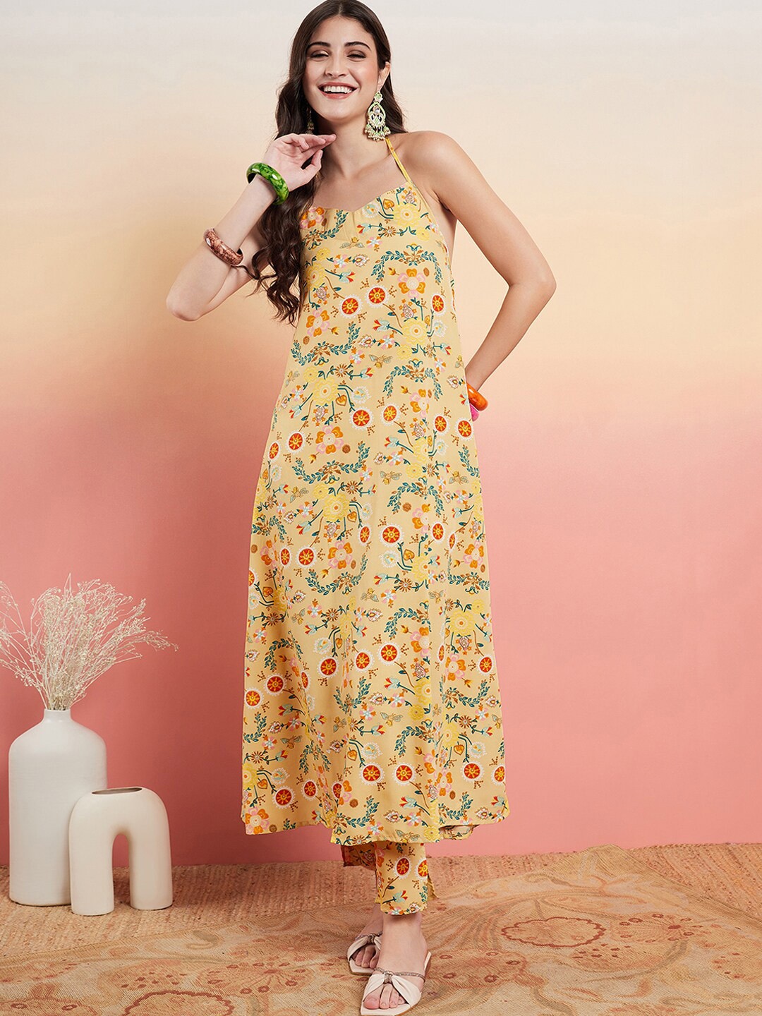 

InWeave Yellow Floral Printed Halter Neck Regular Kurta With Trousers